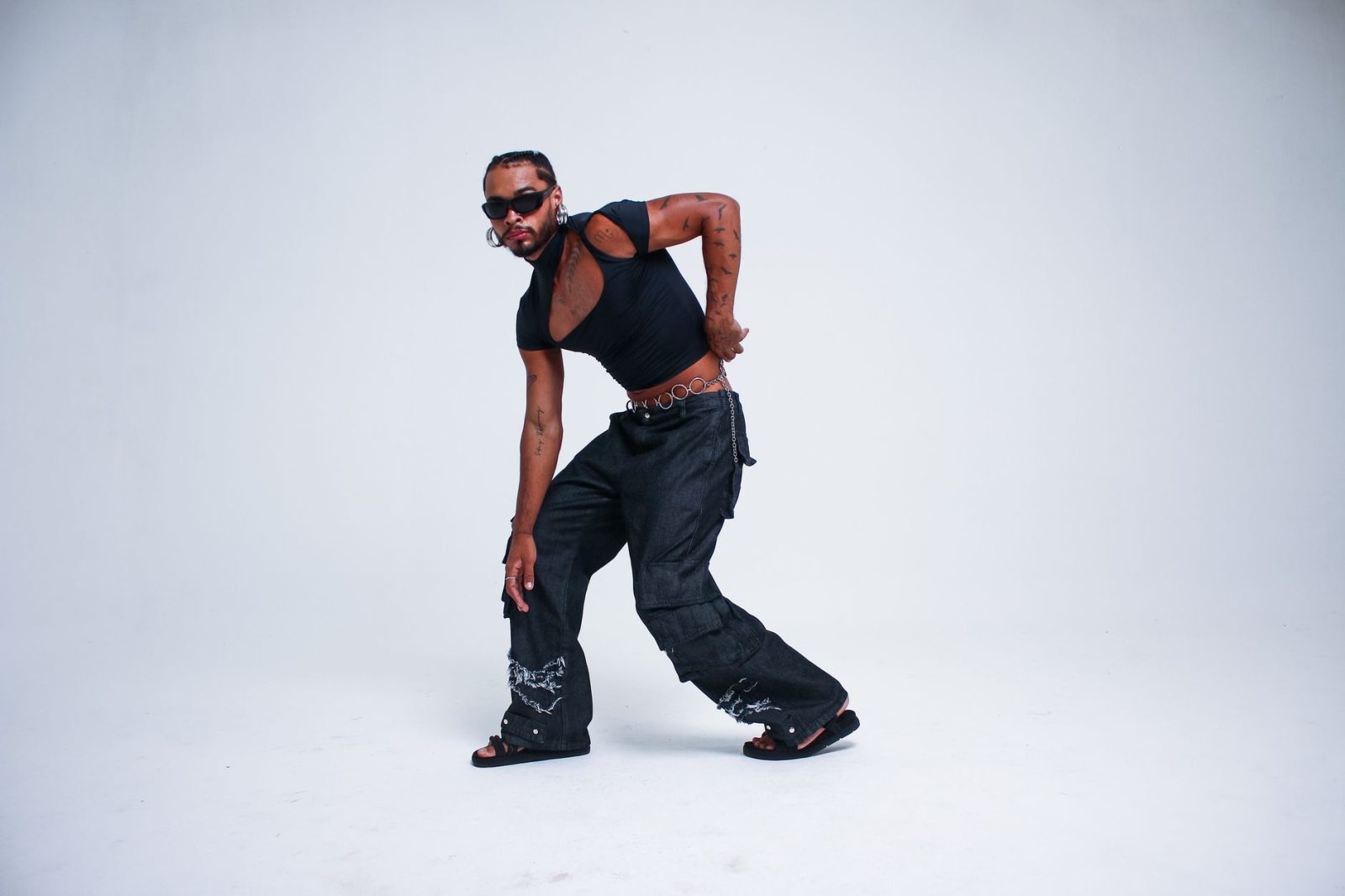 Baggy emo pants styled with alternative fashion accessories representing the ultimate style guide for emo clothing