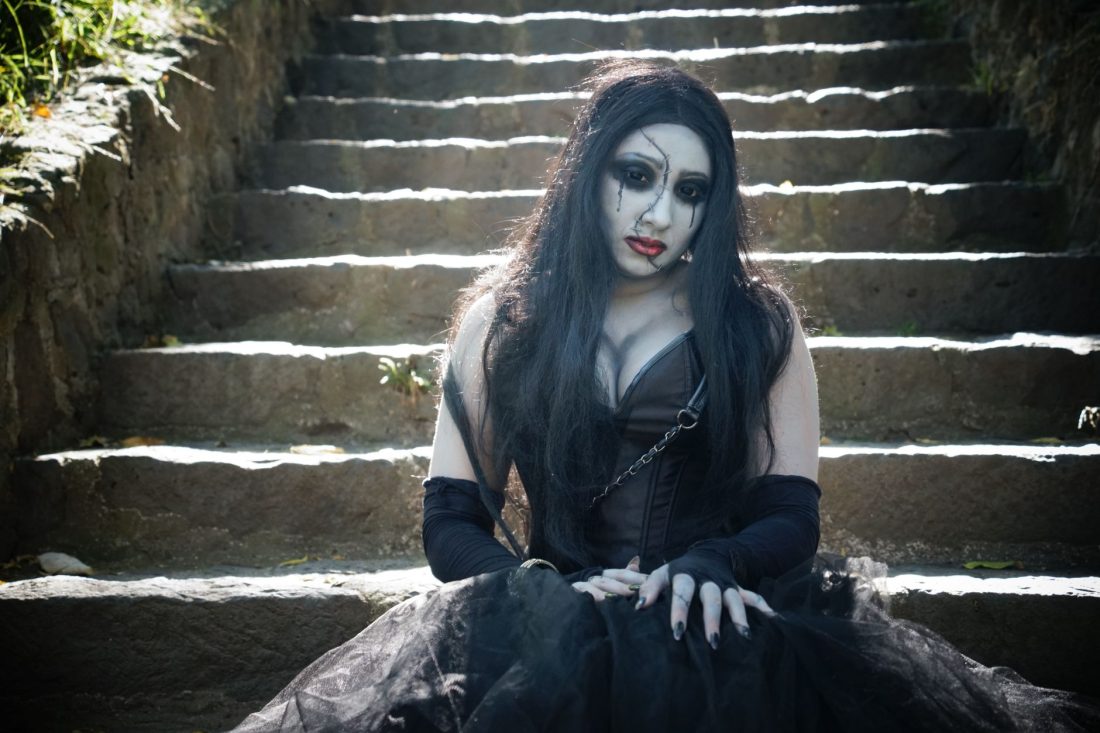 Alternative makeup and styling guide showing dramatic dark eye makeup and goth aesthetic for beginners learning alt fashion techniques