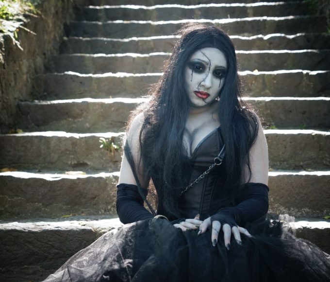 Alternative makeup and styling guide showing dramatic dark eye makeup and goth aesthetic for beginners learning alt fashion techniques