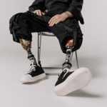 Black emo cargo pants styling guide for beginners showing alternative fashion essentials