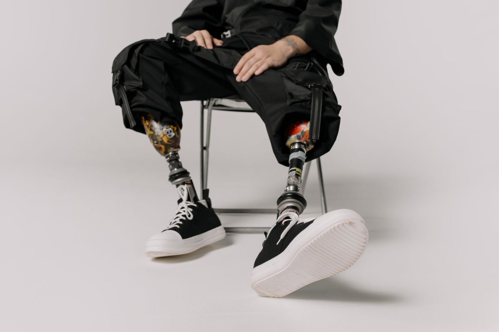 Black emo cargo pants styling guide for beginners showing alternative fashion essentials