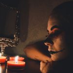 Alternative goth makeup look with dark eyeshadow and bold lips perfect for fall styling and alt fashion aesthetics
