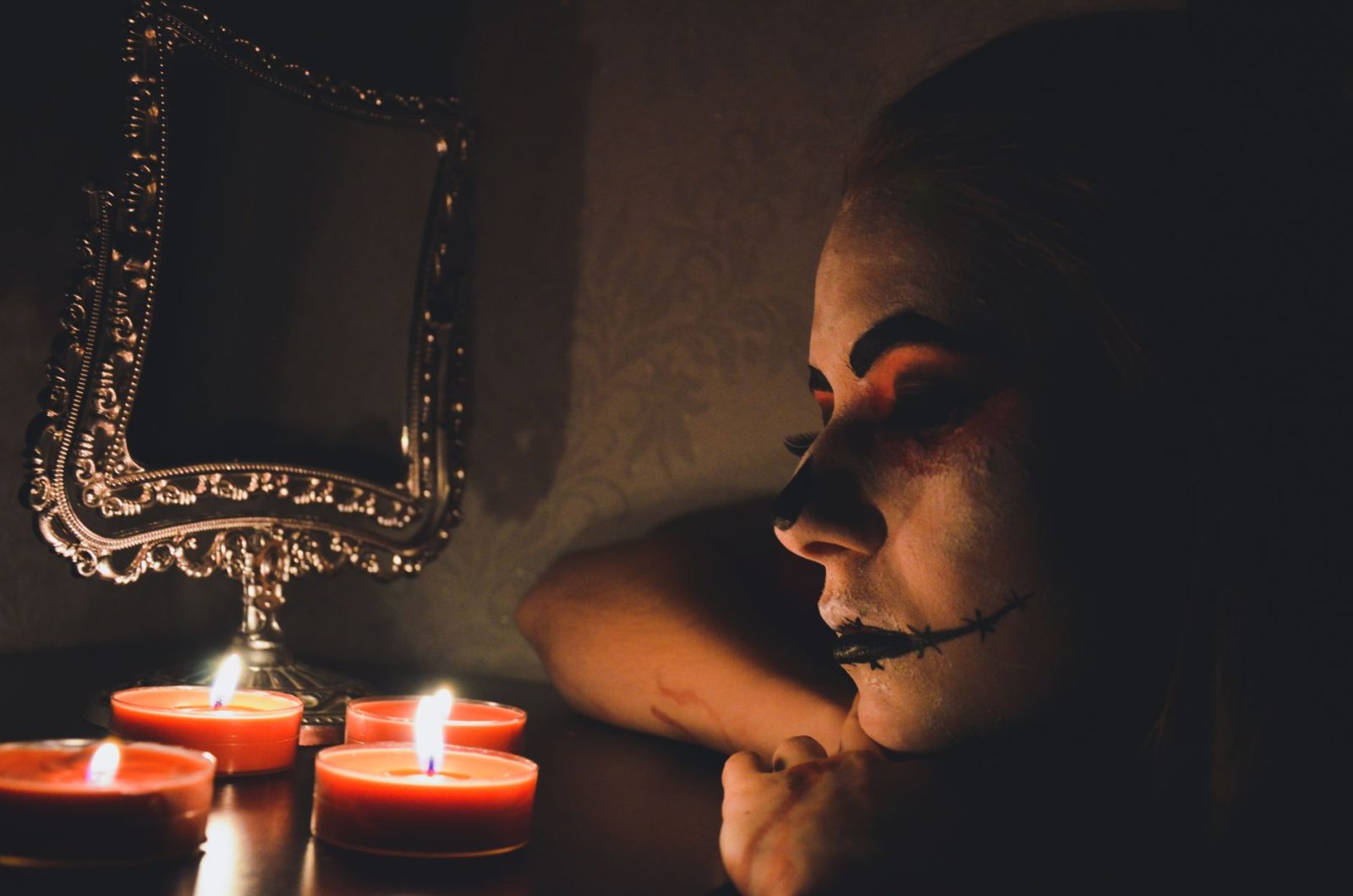 Alternative goth makeup look with dark eyeshadow and bold lips perfect for fall styling and alt fashion aesthetics