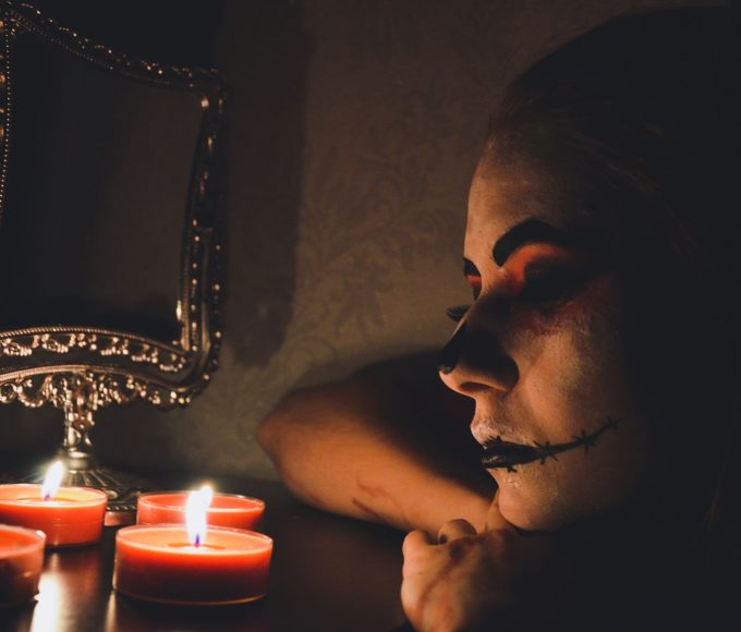 Alternative goth makeup look with dark eyeshadow and bold lips perfect for fall styling and alt fashion aesthetics